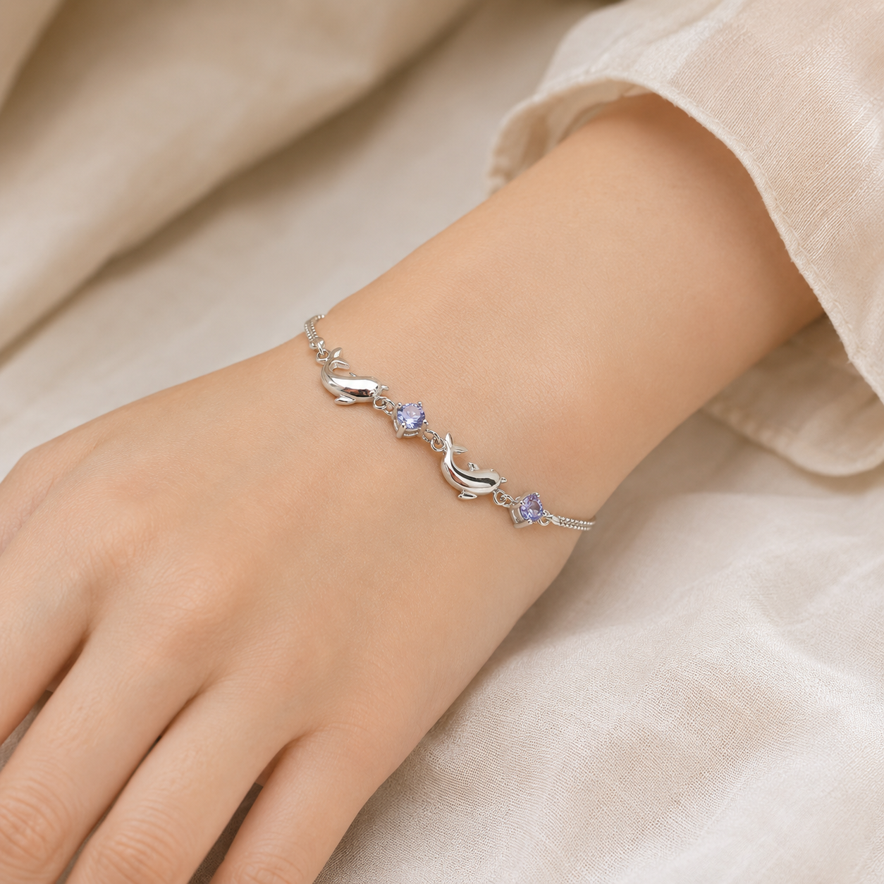 Amethyst dolphin bracelet by Everyday Auraa featuring sterling silver and a detailed dolphin charm for elegant everyday wear.