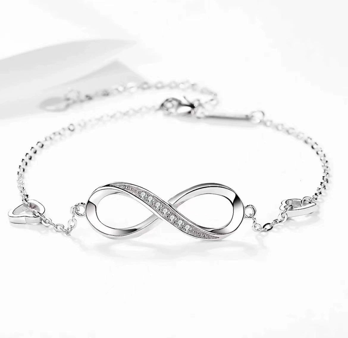 Sterling silver bracelet for women with a minimalist design, featuring a sleek, polished finish and subtle chain details.