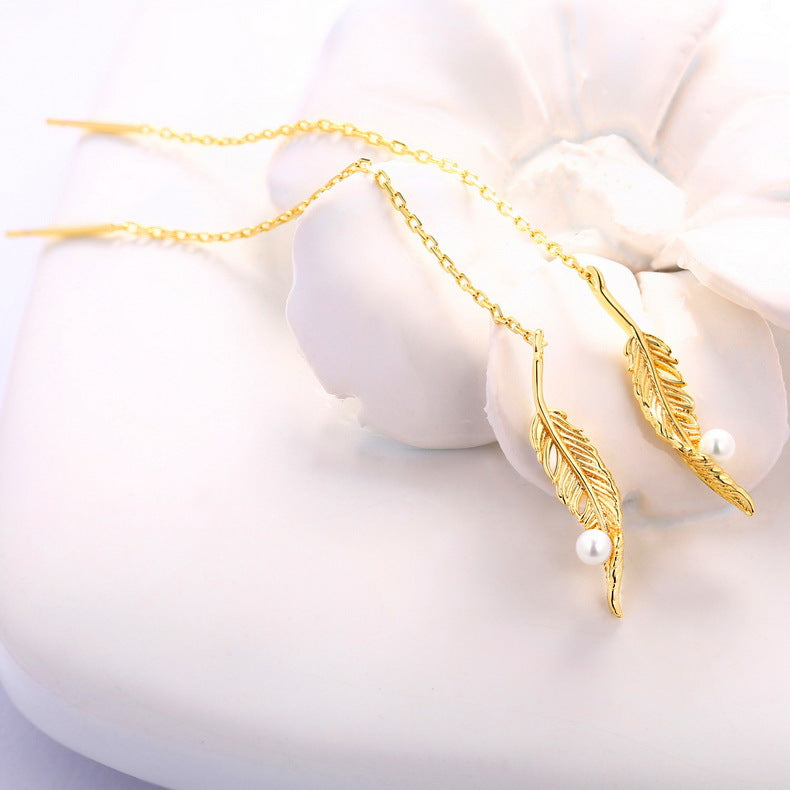 Elegant pearl feather earrings in 925 silver featuring soft luxury style, perfect for everyday wear by Everyday Auraa.