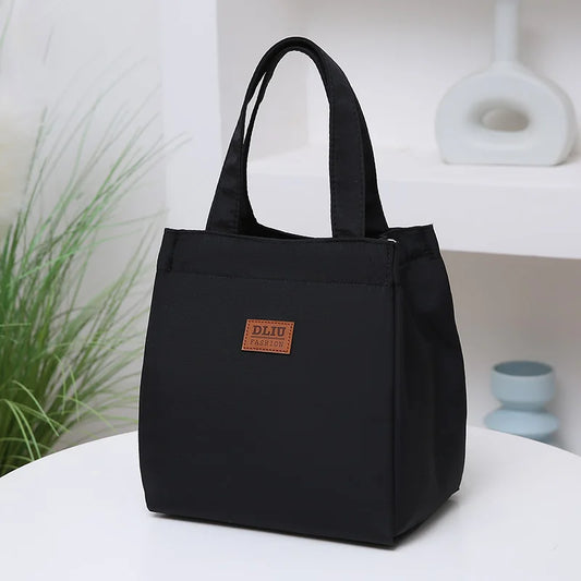 Large insulated lunch bag by Everyday Auraa with aluminum foil thermal lining, top handle, perfect for work and travel food storage.