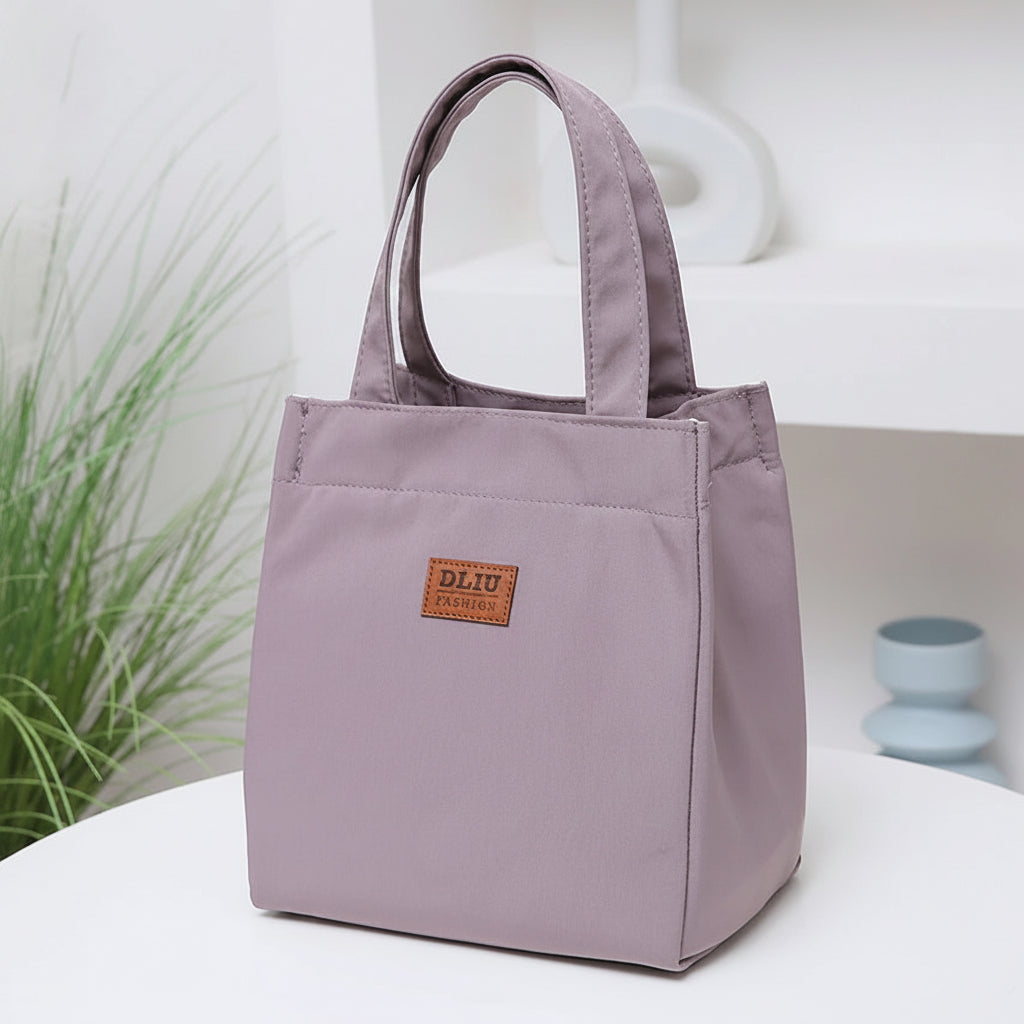Large capacity insulated lunch bag by Everyday Auraa with aluminum foil thermal lining and top handle for work and travel.