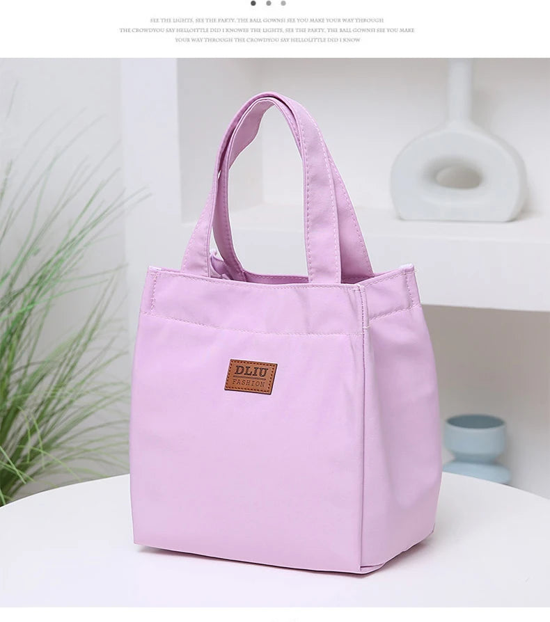 Large insulated lunch bag by Everyday Auraa with aluminum foil thermal lining, top handle, ideal for work and travel food storage.