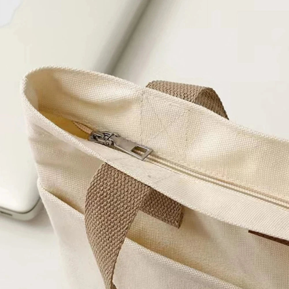 Women’s large capacity canvas tote bag by Everyday Auraa with casual shoulder design, ideal for shopping and everyday carrying.