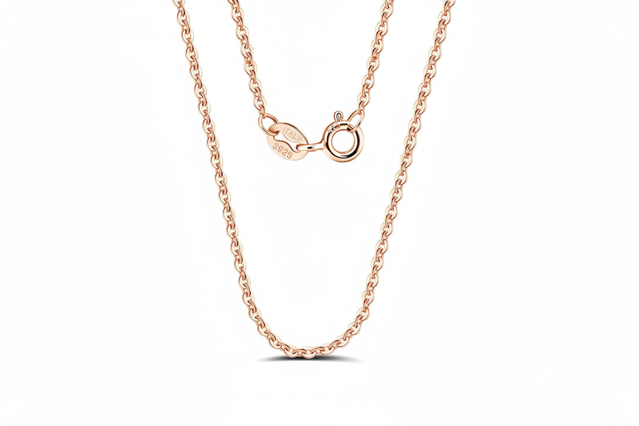 Rose gold chain necklace with and 'Real Sterling Silver 925' stamp on a white background.