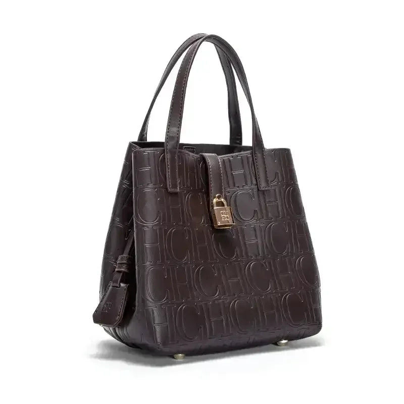Everyday Auraa women's embossed crossbody tote bag with letter design, large capacity, elegant shoulder purse for everyday use.