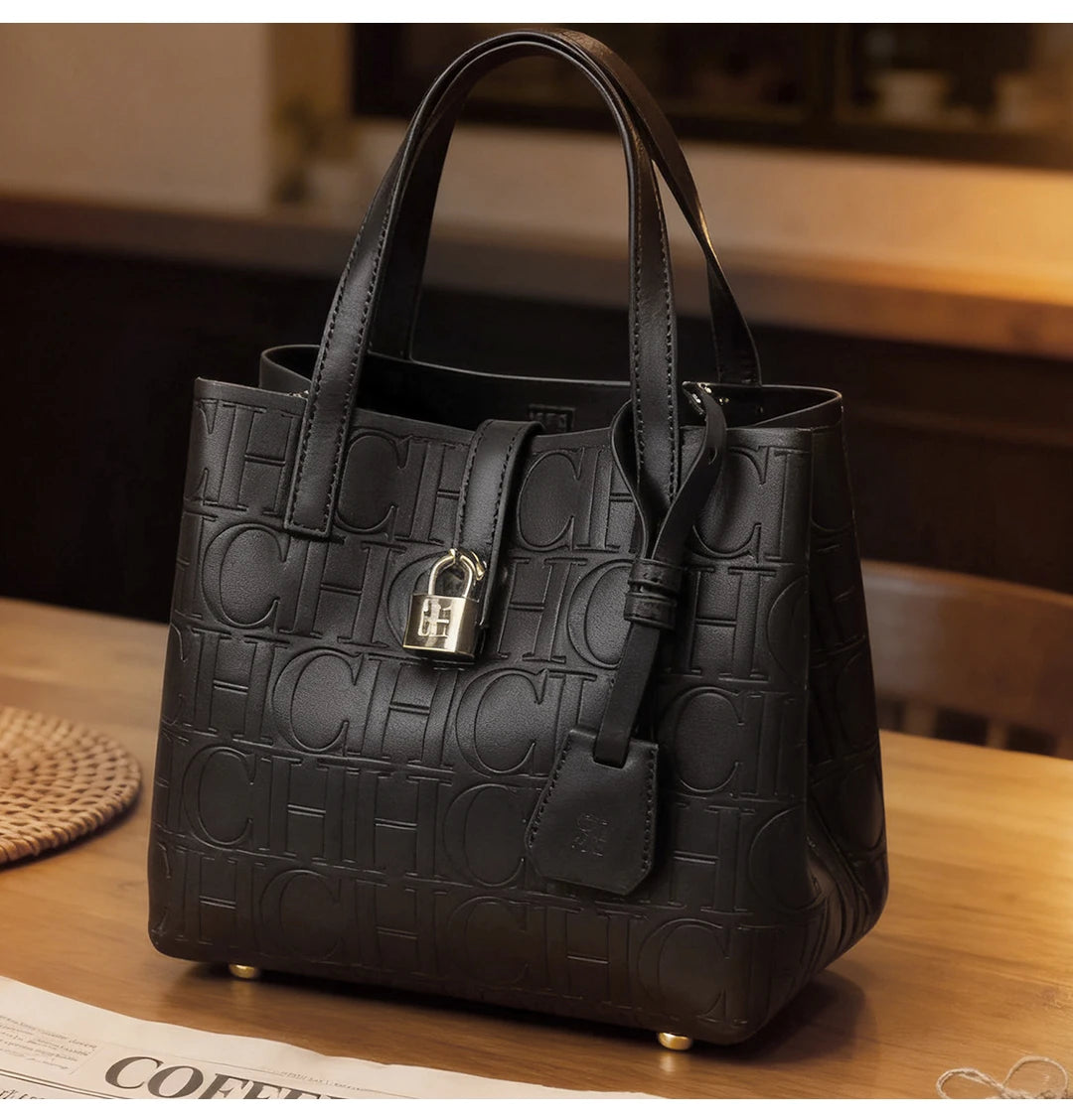 Elegant women’s crossbody tote bag by Everyday Auraa with embossed letter design, large capacity, and shoulder strap for versatile use