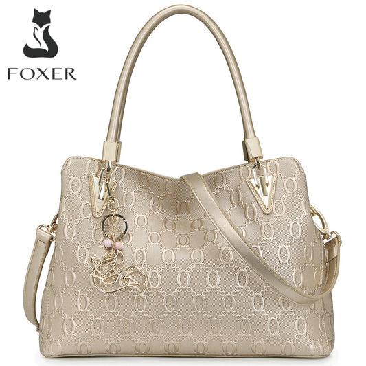 Elegant FOXER women's split leather tote bag with top handle and shoulder strap, featuring a large capacity and stylish design.