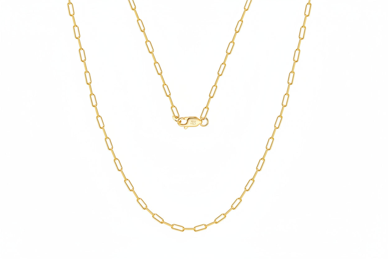 Gold chain necklace with a visible hallmark 