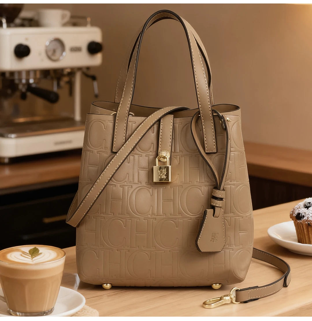 Embossed women’s crossbody tote bag by Everyday Auraa with letter design, large capacity, elegant shoulder purse, and handbag style.