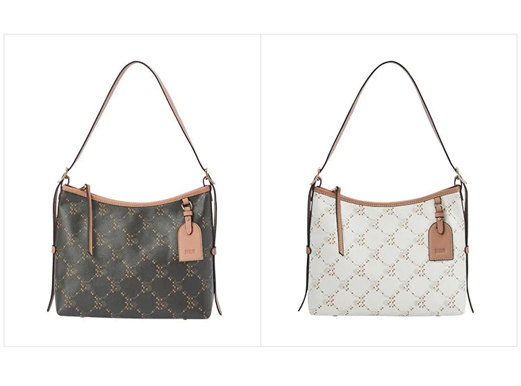 Women’s vintage monogram tote bag by Everyday Auraa with textured surface, shoulder strap, and spacious interior for work and everyday use.