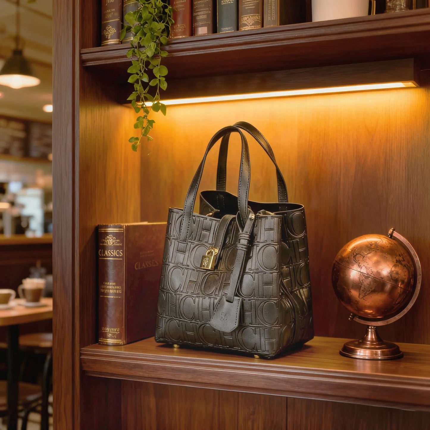 Elegant embossed women's crossbody tote bag with letter design, large capacity, shoulder strap, and stylish handbag by Everyday Auraa.