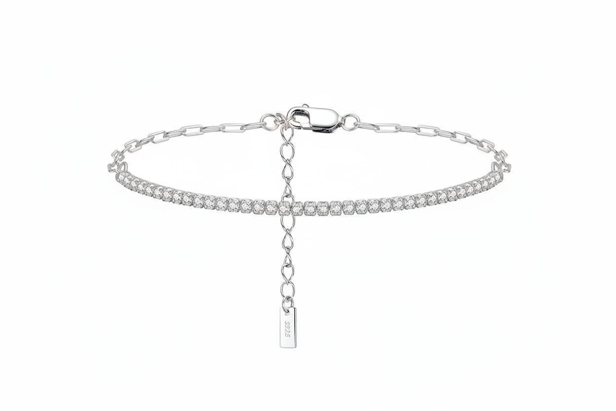 Silver bracelet with a tag on a white background, featuring 'Real 925 Sterling Silver' stamp.