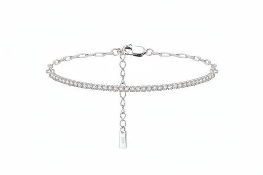 Silver bracelet with a tag on a white background, featuring 'Real 925 Sterling Silver' stamp.