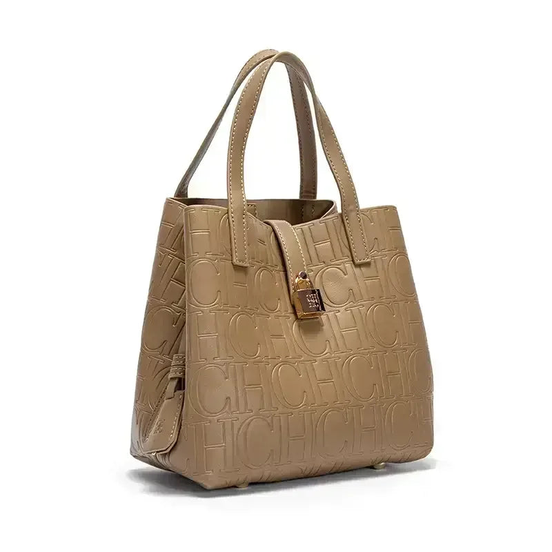 Everyday Auraa CH embossed women's crossbody tote bag with letter design, large capacity, elegant shoulder purse on black background.