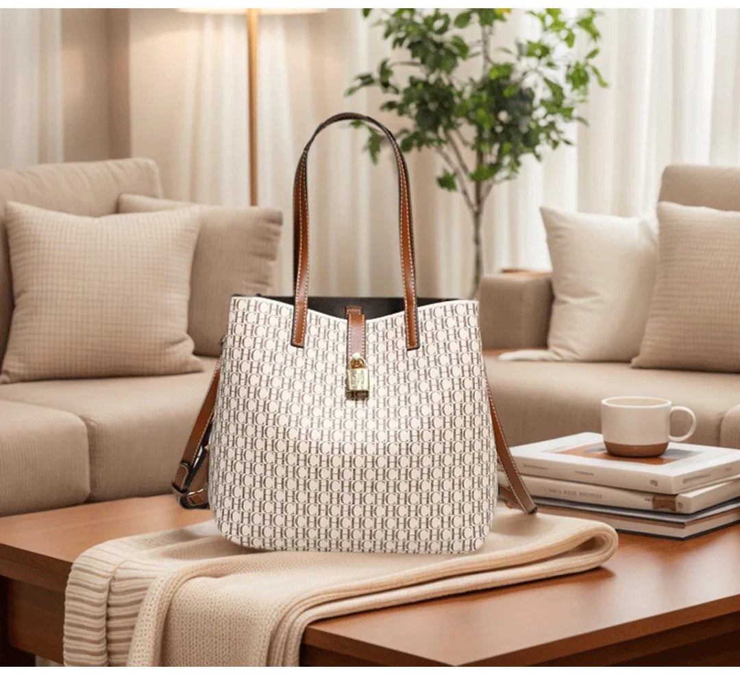 Everyday Auraa women's crossbody tote bag in letter print PU leather, large capacity daily commuter handbag with a sleek design.