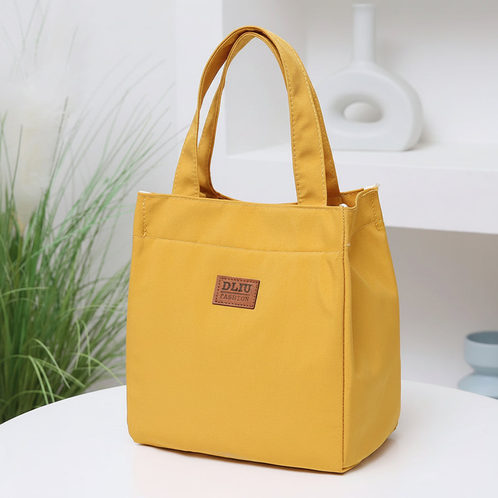 Large insulated lunch bag by Everyday Auraa with thermal foil lining, top handle, ideal for work and travel food storage.