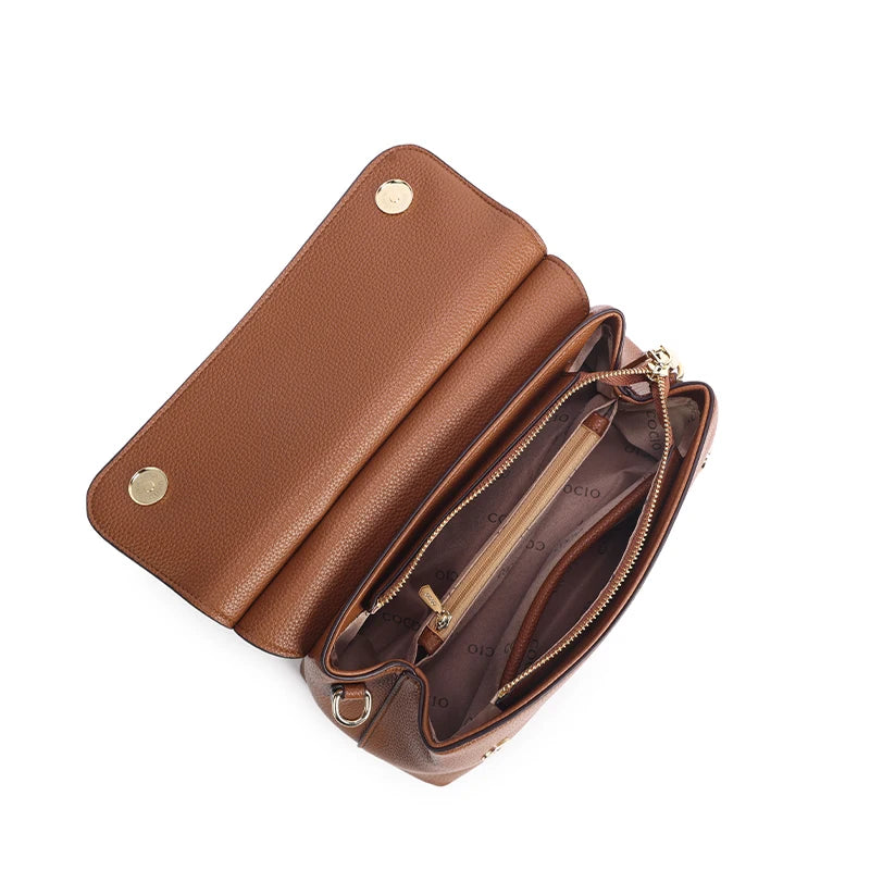 Leather women's backpack by Everyday Auraa featuring a stylish, daily-use rucksack design with crossbody strap and modern fashion appeal.