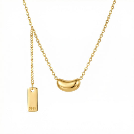 Sterling silver minimalist bean pendant necklace with dainty chain and S925 hallmark tag, by Everyday Auraa.